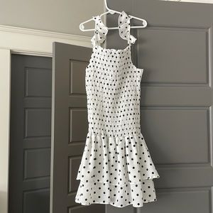 dress with black polka dots, smocked at top with ruffles on bottom- NEVER WORN